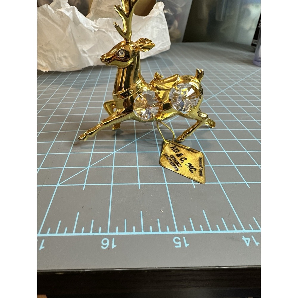 KG & C REINDEER SWAROVSKI (R) CRYSTAL TEMPTATIONS GOLD ORNAMENT FIGURINE NWT
